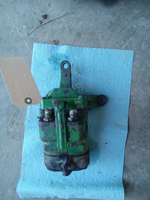 John Deere  RE22586, marked as R73116  Beakaway Coupler Assembly 