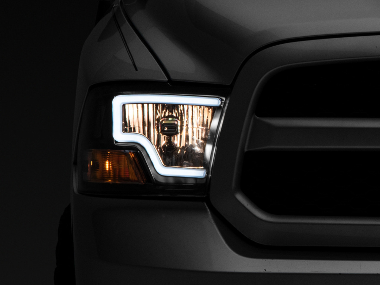 Raxiom 09-18 Dodge RAM 1500 LED Bar Headlights- Black Housing (Clear Lens) - R117803 Photo - Primary