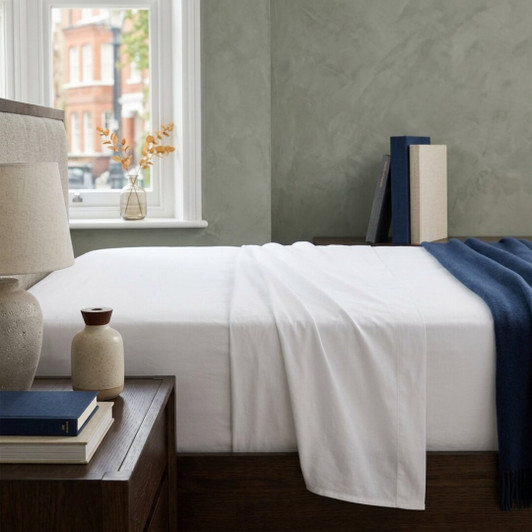 white-percale-flat-sheet-on-bed-showing-crisp-cotton-weave-and-premium-quality-drape