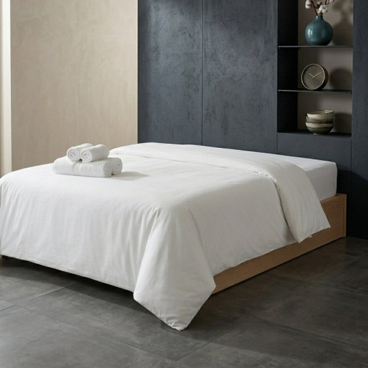 white-polycotton-duvet-cover-on-bed-with-soft-cotton-blend-drape-and-finish