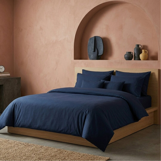 navy-microfibre-duvet-cover-and-pillowcases-on-wooden-bed-frame-soft-finish