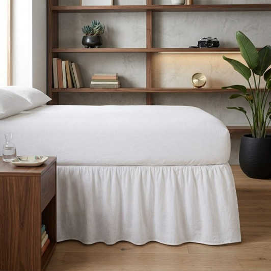 white-frilled-valance-sheet-on-bed-with-gathered-ruffle-design-hiding-bed-base