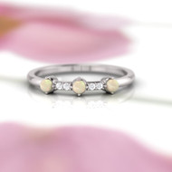 Opal eternity rings.