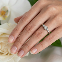 diamond ring on a hand. happy floral image