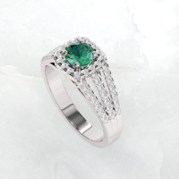 emerald and diamond engagement ring by Ascheron