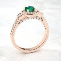 rose gold emerald engagement ring by jeweler Ascheron.