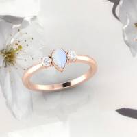 pear shape moonstone ring with diamonds in rose gold