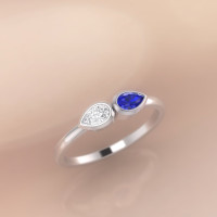 Engagement ring by ASCHERON. Whitest diamond and blue sapphire ring.