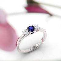 white gold sapphire and diamond ring, suitable for everyday wear. This ring has a very comfortable gold band. The blue sapphire is very impressive.