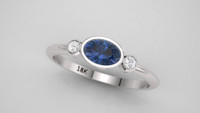 oval sapphire ring with two diamonds