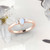 pear shape moonstone ring with diamonds in rose gold