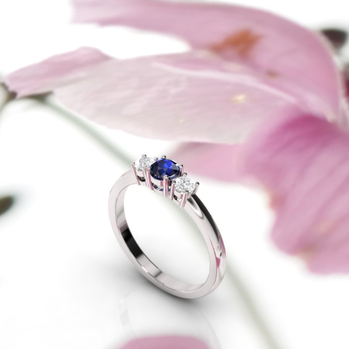 side view of white gold sapphire ring.