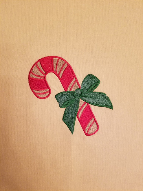 Candy Cane - Silver - Kitchen Towel - 20" x 28"
Embroidery on a white towel.
100% Cotton with loop, for optional hanging.
Machine washable in cool water and tumble dry at low temperature.
Minimal shrinkage.
Size: 20" x 28"