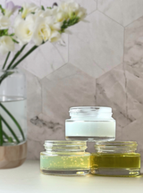 Facial Care Discovery Set opened jars on vanity