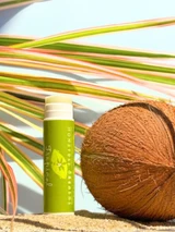 Tropical Lip Balm with tropical plant on sand