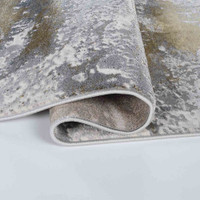 gold grey abstract rug folded