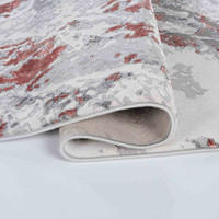 pink grey abstract rug folded