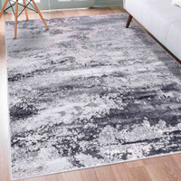silver grey abstract rug in living space
