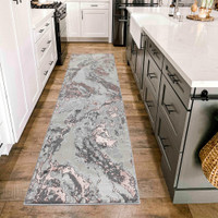 pink grey abstract rug runner in a kitchen