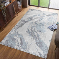 grey abstract rug in a living room