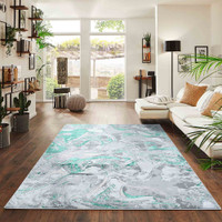 aqua grey abstract rug in a living room