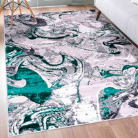 aqua grey abstract rug in a living room