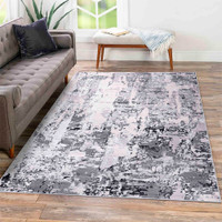 grey abstract rug in a living room