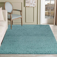 plain shaggy duck egg rug in a living room