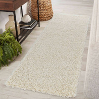 plain shaggy ivory rug runner in hallway