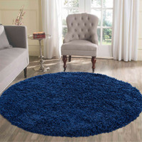 plain shaggy navy circle rug in a living room
