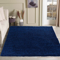 plain shaggy navy rug in a living room