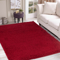 plain shaggy red rug in a living room