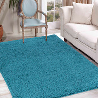 plain shaggy teal rug in a living room