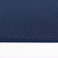 plain low pile navy rug runner closeup edge on white floor