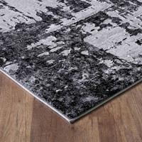modern abstract lines black rug runner closeup corner on wooden floor