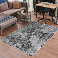 modern abstract lines black rug in a living room