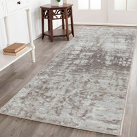 modern abstract lines stone rug runner in a hallway