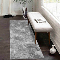 modern abstract sprayed grey rug runner in a hallway