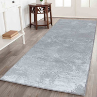 modern abstract sprayed grey rug runner in a hallway