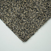 brown dirt trapper doormat closeup corner