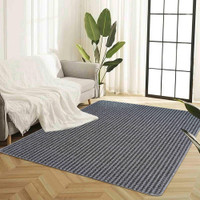 grey non-slip dirt trapper mat in a living room