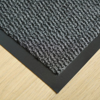 anthracite non-slip dirt trapper mat closeup corner on wood floor