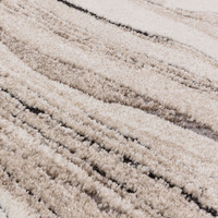 abstract beige shaggy rug closeup detail