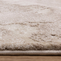 abstract beige shaggy rug closeup edge