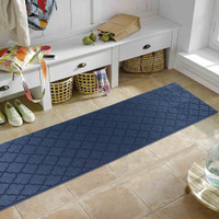 trellis navy doormat runner in a living room