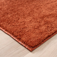 plain terracotta rug runner side view of corner