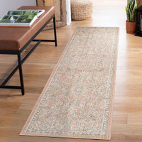 traditional floral coral rug runner in a hallway