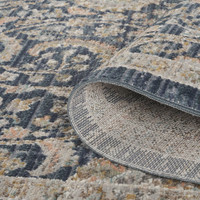 traditional floral navy rug runner closeup rolled