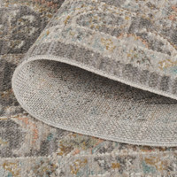 traditional floral grey rug runner closeup rolled