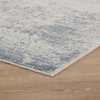 abstract navy rug side angle closeup corner